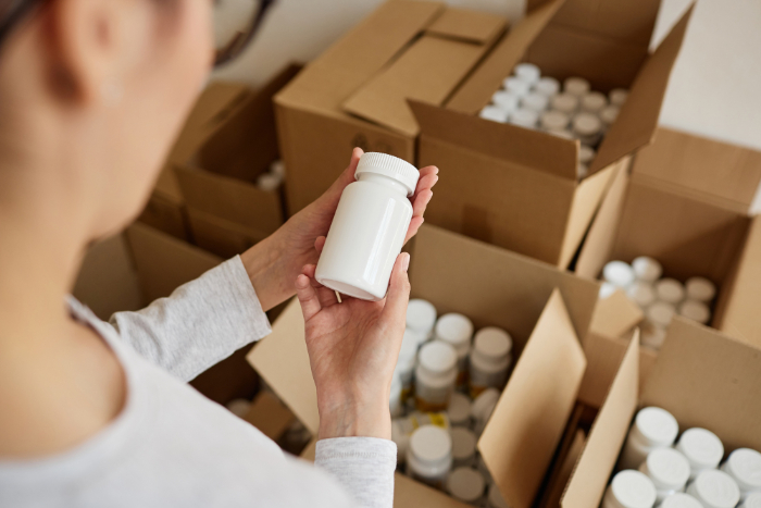 Shop_woman packing products Shop_woman packing products
